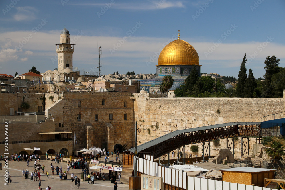 Jerusalem, Israel - May 16, 2018: View of the Wailing Wall in Jerusalem with the Dome of the Rock in the background, Israel.