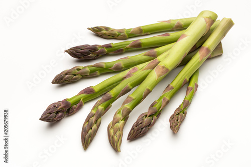 Fresh green asparagus on white background.