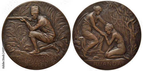 France French medal on repartition of colonies in Africa after World War I, native inhabitant aiming a gun in jungle, Camerun, Tabora, 1914, 1918, Rhodesie inscription below, two allegorical females  photo
