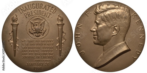 United States of America John F. Kennedy inauguration medal, citation from inauguration speech flanked by torches, eagle in circle of stars above, John F. Kennedy bust left,