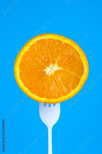 orange fruit fresh bright fork art background