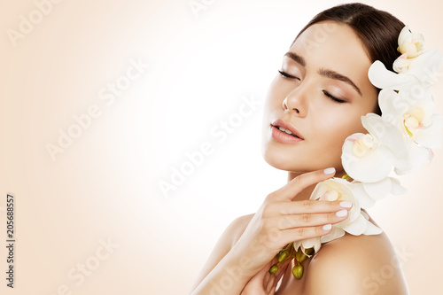 Woman Beauty, Face Skin Care and Make Up, Girl Orchid Flower in Straight Hair, Beautiful Makeup and Skincare