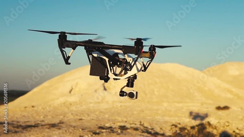 Drone flies over the hills