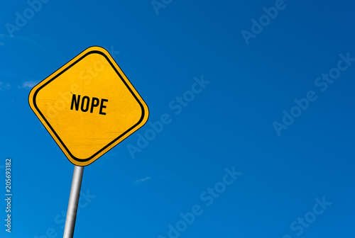 nope - yellow sign with blue sky illustration photo