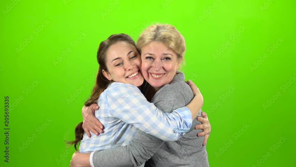 Native hugs, they are stand and talking. Green screen Native hugs, they are stand and talking. Green screen