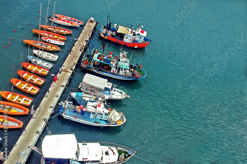 View from the height of the moored yachts. Top view from drone of the marina.