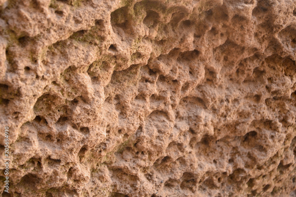 Abstract relief porous sand stone brown beige surface, background, texture. . Abstract relief porous sand stone brown beige surface, background, texture. .