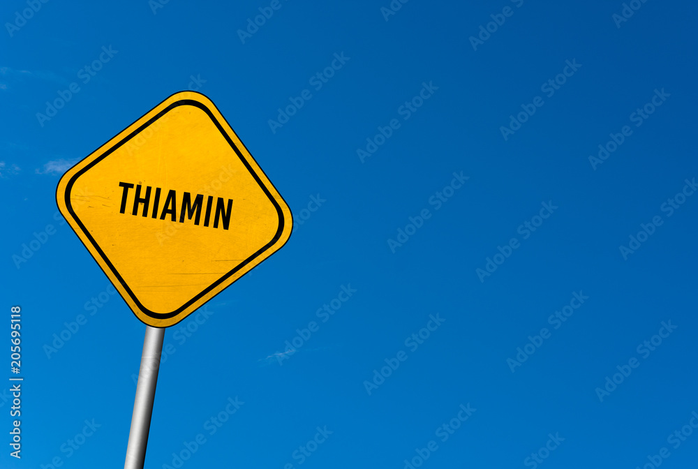 Thiamin - yellow sign with blue sky Thiamin - yellow sign with blue sky