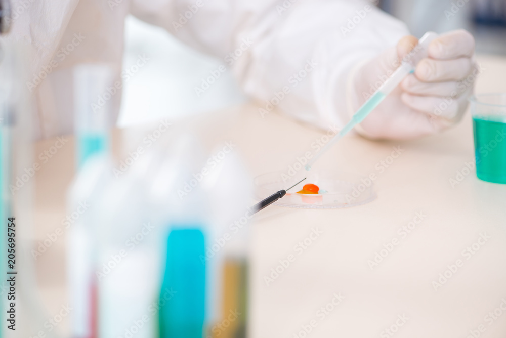 Male chemist working in lab Male chemist working in lab