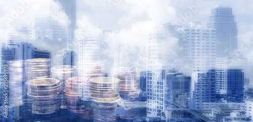 Double exposure image of the city and coins money , cryptocurrency concept