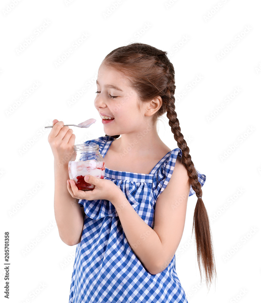Cute girl eating tasty yogurt on white background Cute girl eating tasty yogurt on white background