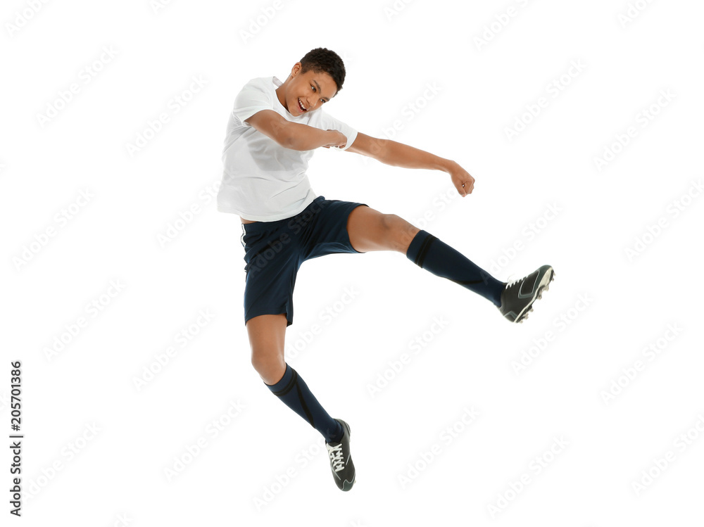 Teenage African-American boy playing football on white background Teenage African-American boy playing football on white background