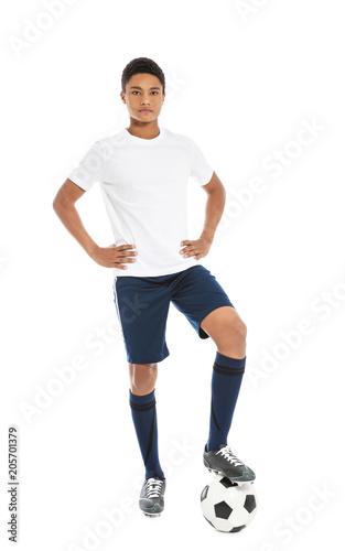 Teenage African-American football player on white background