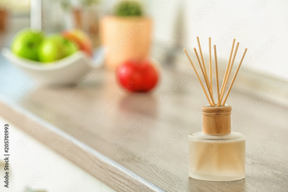 Aromatic reed freshener on table indoors Aromatic reed freshener on table indoors