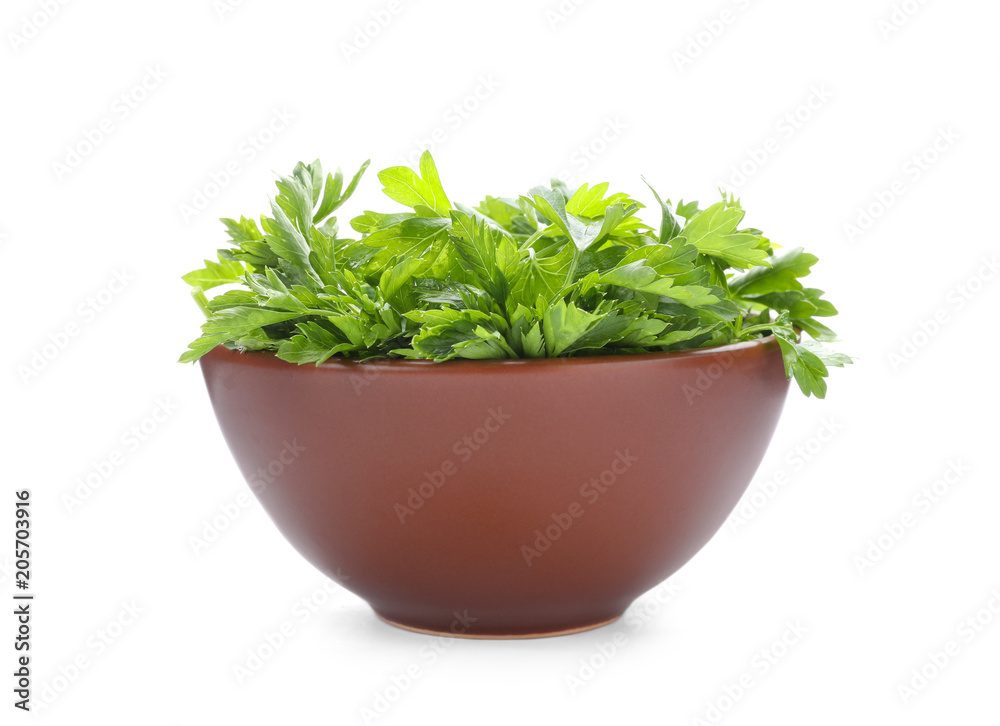 Bowl with fresh green parsley on white background