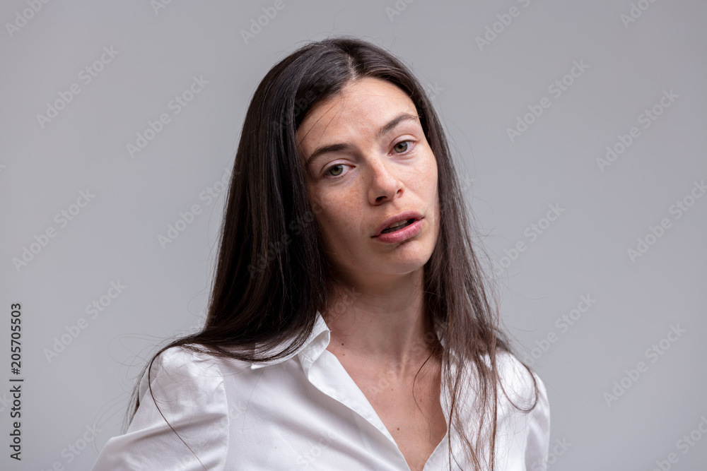 Fototapeta premium Sympathetic genuine young woman