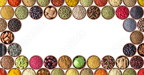 Fototapeta Naklejka Na Ścianę i Meble -  various condiments isolated on white background. spices and herbs in cups