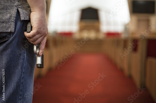 Church Shoots - A man carring a gun inside a church building - To harm or to protect?