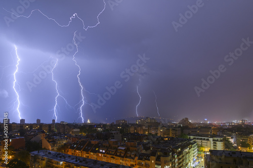 Lightning and storm over Varna, Bulgaria, Night cityscape.