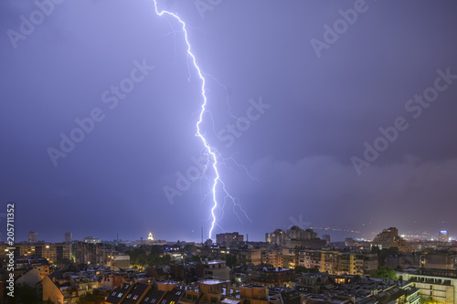 Lightning and storm over Varna, Bulgaria, Night cityscape.