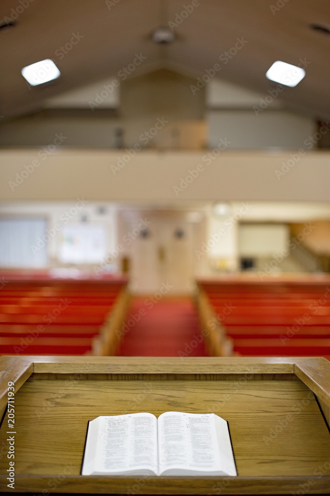 Bible on the Pulpit in a Church Auditorium - obrazy, fototapety, plakaty 