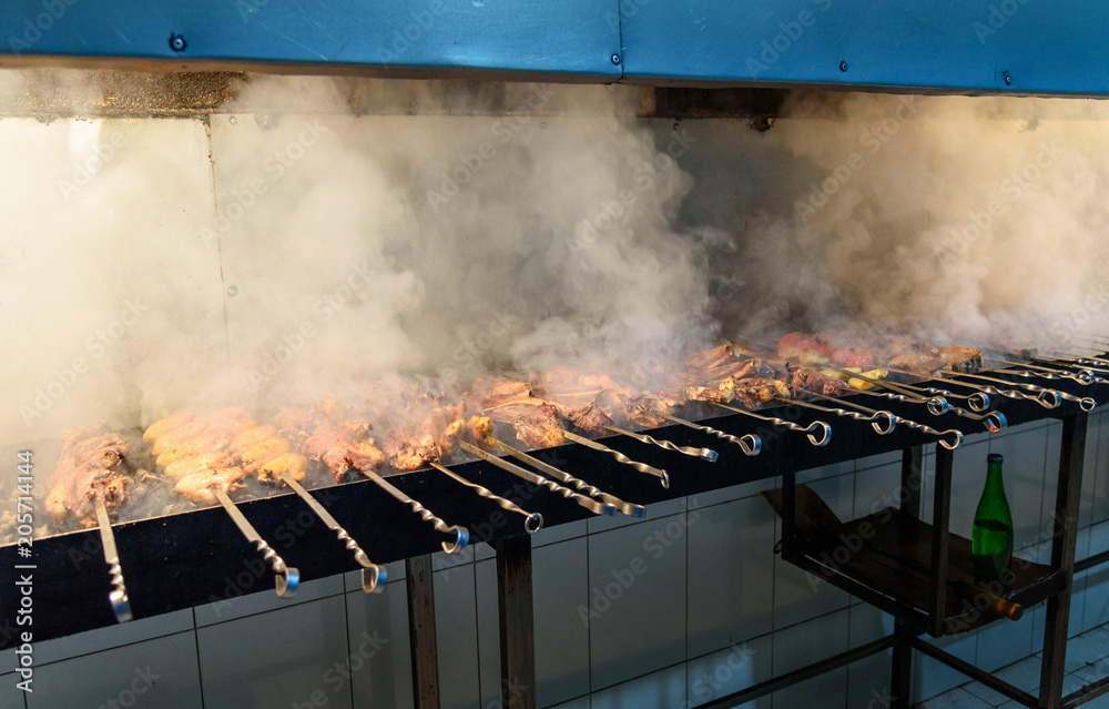 Meat grilled over charcoal