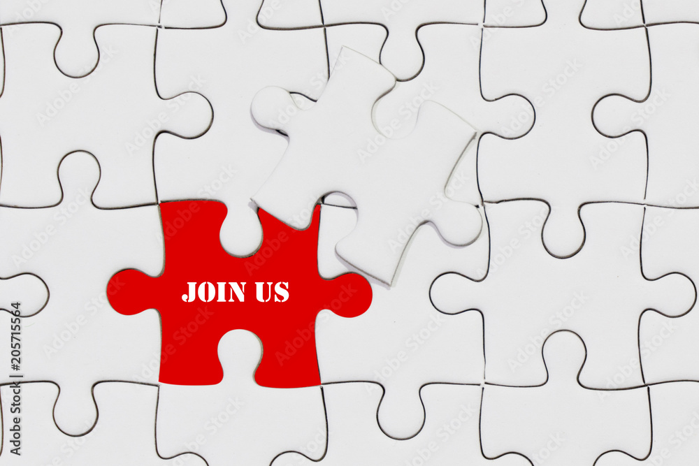 piece of jigsaw puzzle with join us wording for business concept piece of jigsaw puzzle with join us wording for business concept