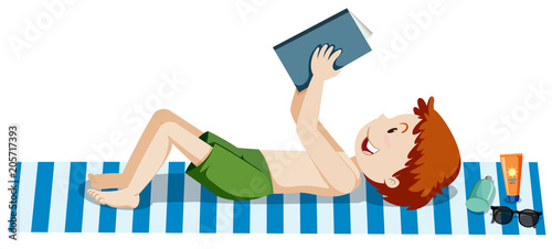 A Boy Reading a Book at the Beach