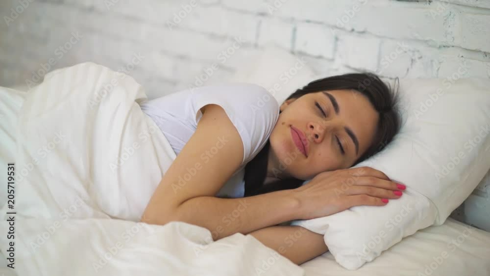 Sleep. Beautiful girl goes to bed and falls asleep. Sleep. Beautiful girl goes to bed and falls asleep.