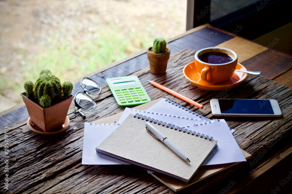 Desk work coffee cup and laptop notebook pen on wooden table Desk work coffee cup and laptop notebook pen on wooden table