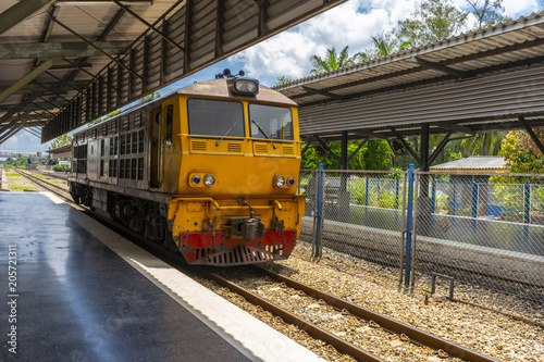 Yellow train in Train Station, Thailand train