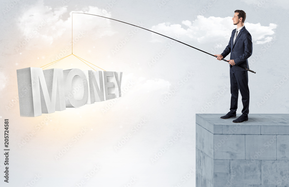 Young businessman fishing money, income from the top of a building
Young businessman fishing money, income from the top of a building