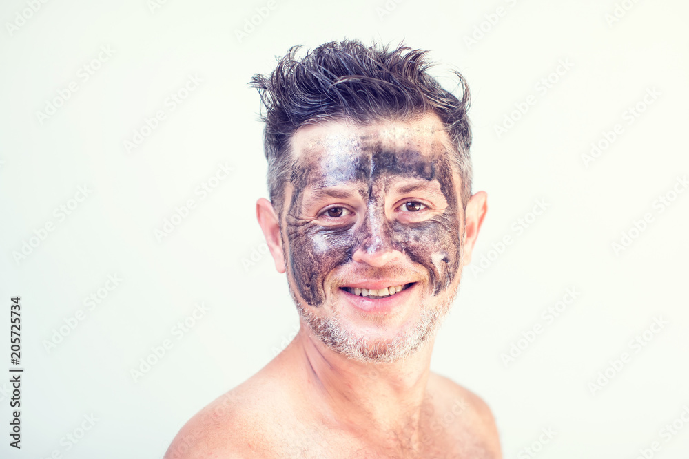 Handsome man with black face mask on his face Handsome man with black face mask on his face