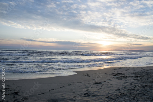 Waves at sunset  the beach at Italy - Summer season