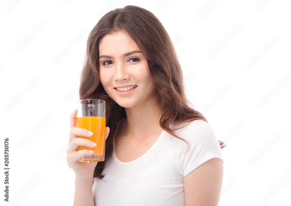 Portrait of a woman drinking orange juice. Orange juice in glass Portrait of a woman drinking orange juice. Orange juice in glass