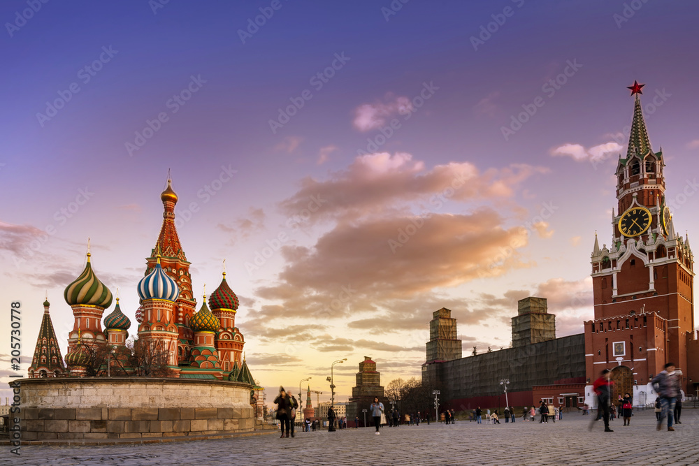 moscow city sunset, St. Basil's Cathedral and Kremlin Walls and Tower in Red square in sunny blue sky. Red square  is Attractions popular's touris in Moscow, Russia,