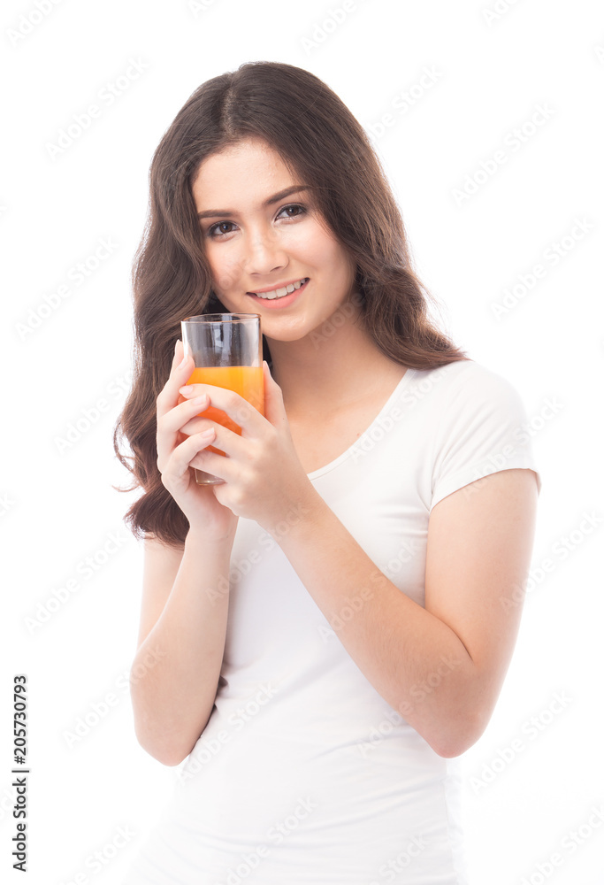 Portrait of a woman drinking orange juice. Orange juice in glass Portrait of a woman drinking orange juice. Orange juice in glass