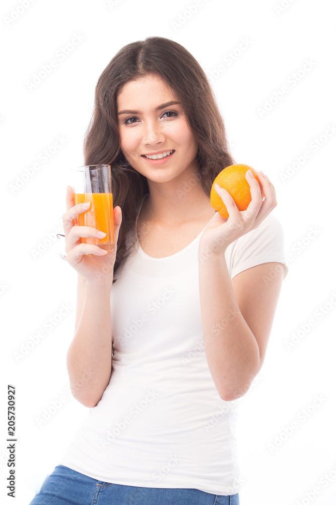 Portrait of a woman drinking orange juice. Orange juice in glass Portrait of a woman drinking orange juice. Orange juice in glass