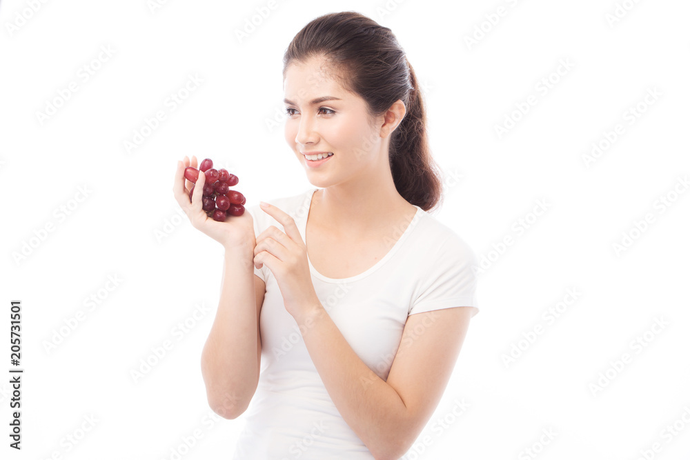 Asian Woman diet concept portrait with red grape fruit Asian Woman diet concept portrait with red grape fruit