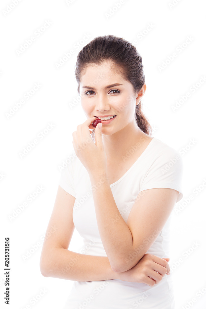 Asian Woman diet concept portrait with red grape fruit Asian Woman diet concept portrait with red grape fruit