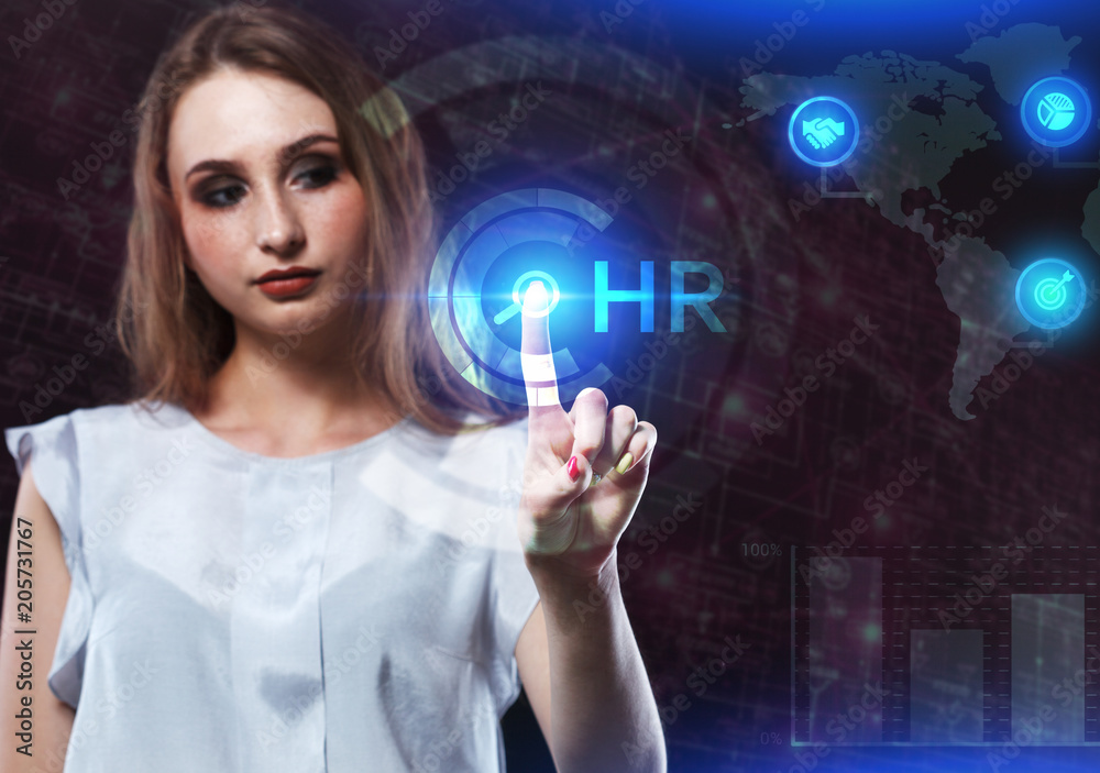 The concept of business, technology, the Internet and the network. A young entrepreneur working on a virtual screen of the future and sees the inscription: HR The concept of business, technology, the Internet and the network. A young entrepreneur working on a virtual screen of the future and sees the inscription: HR