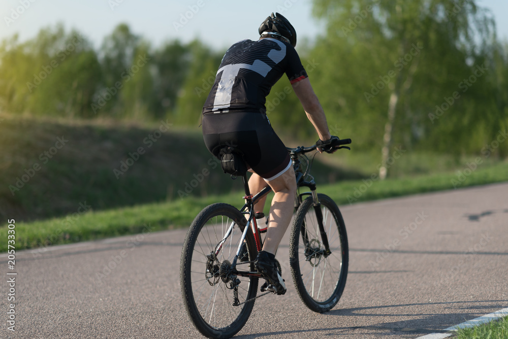 Sport. Mountain Bike cyclist riding single track Sport. Mountain Bike cyclist riding single track