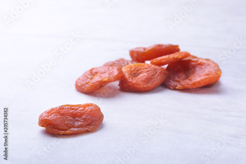 dried apricots isolated white background. selective focus. photo