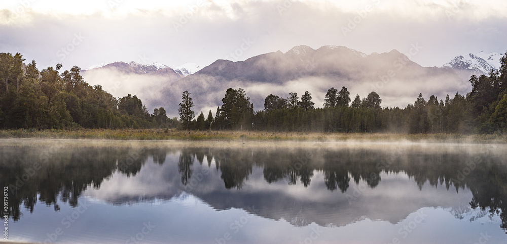 Fototapeta premium New Zealand lake view refection with morning sunrise sky