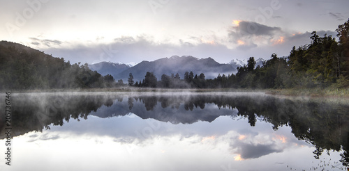 New Zealand lake view refection with morning sunrise sky photo