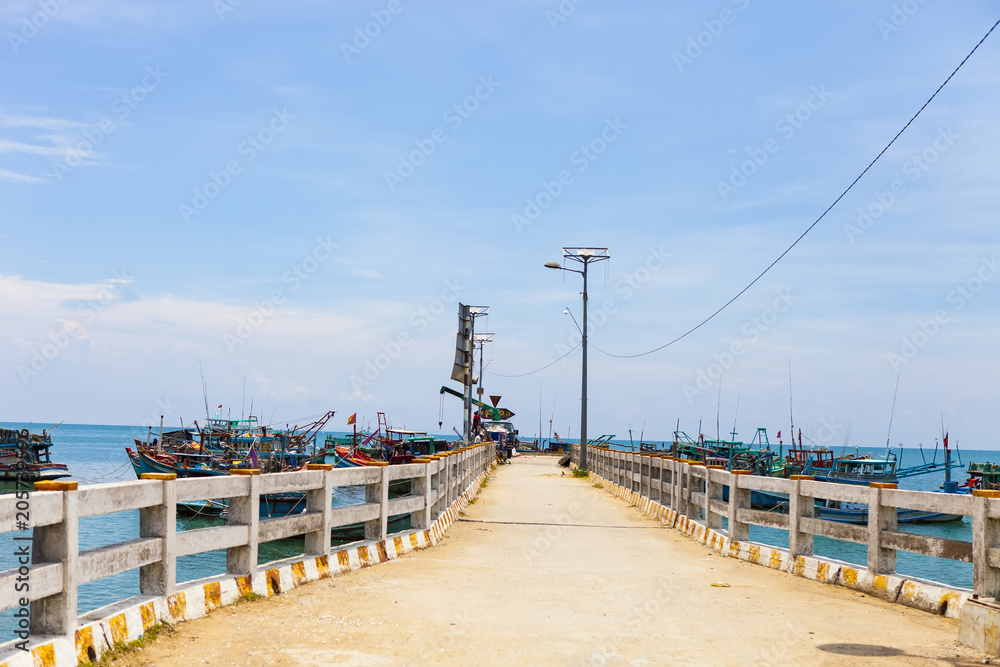 Obraz premium KIEN GIANG, VIETNAM, May 12th, 2018: Wharves at Nha beach on Son island, Kien Giang, Vietnam. Near Phu Quoc island