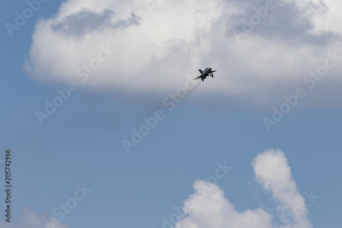 Military fighter jet in flyby