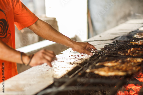 fry seafood on a grill © Kate