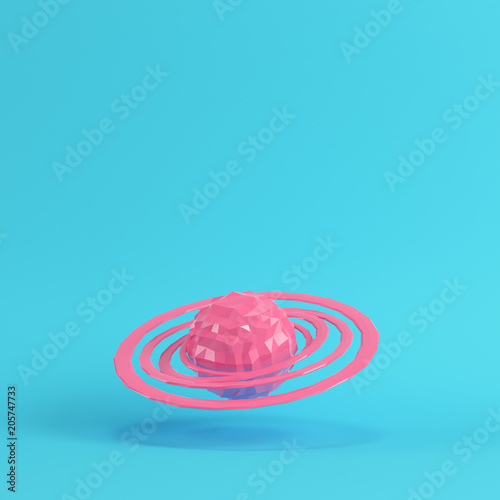 Fototapeta Naklejka Na Ścianę i Meble -  Pink abstract planet with rings on bright blue background in pastel colors