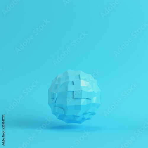 Fototapeta Naklejka Na Ścianę i Meble -  Blue abstract low poly planet on bright blue background in pastel colors. Minimalism concept
